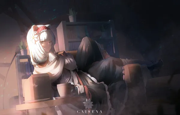Anime girl with cat ears is sitting on a couch