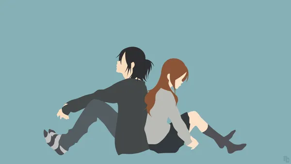 Boy and a girl are sitting back-to-back