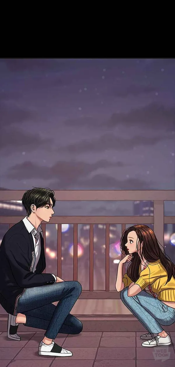 Boy and a girl are talking on a rooftop