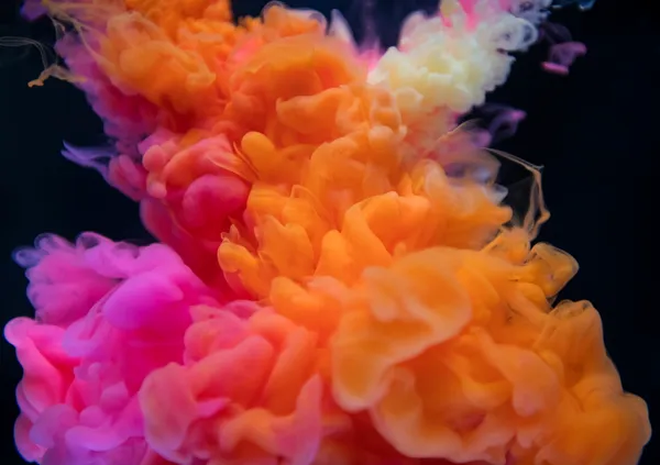 Colorful smoke-like shapes on a black background