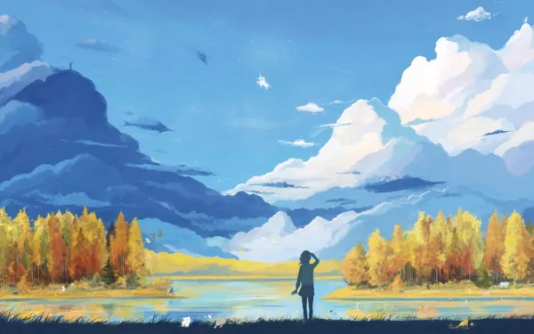 Girl standing on the edge of a lake, looking out at the mountains in the