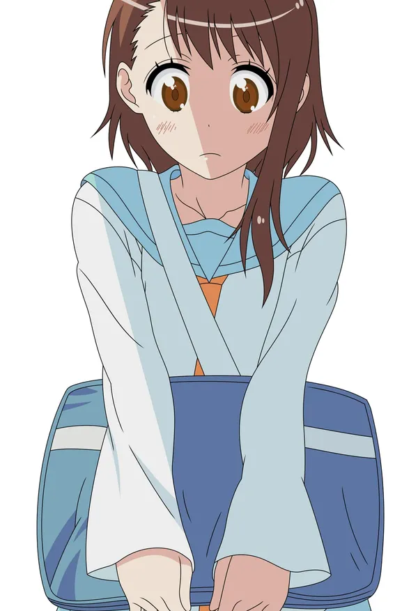 Girl with brown hair and brown eyes looks embarrassed