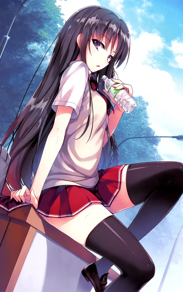 Girl with long black hair drinking a water bottle