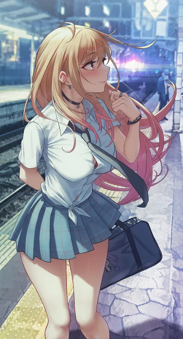 Girl with long blonde hair and pink tips is standing on a train platform