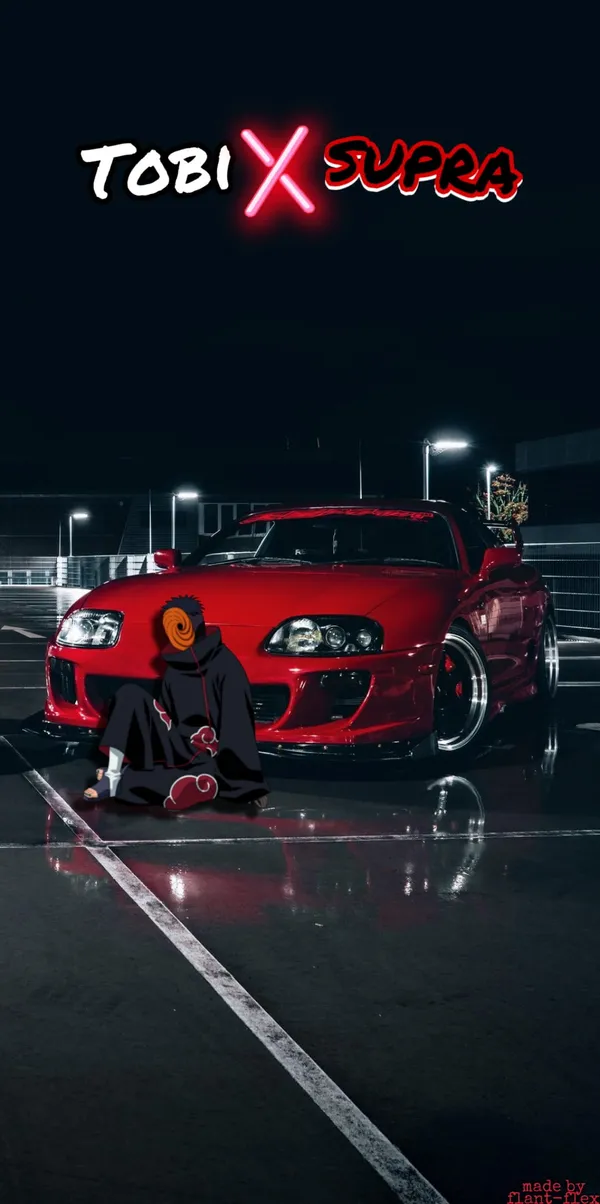 Red sports car with a black and red character sitting on the ground in front
