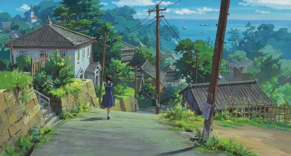 The photo shows a girl walking down a steep street in a small town