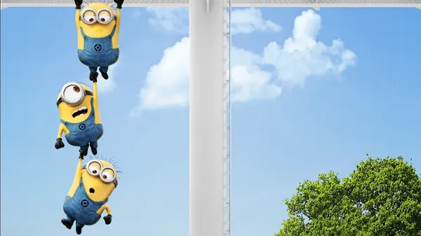 Three yellow cartoon characters hanging from a metal structure with a blue sky and clouds