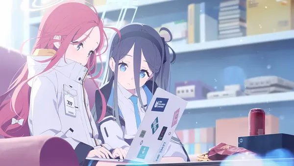 Two anime girls are sitting on a couch looking at a laptop