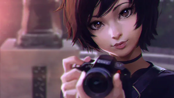 Young woman with short brown hair is holding a camera and looking at the camera